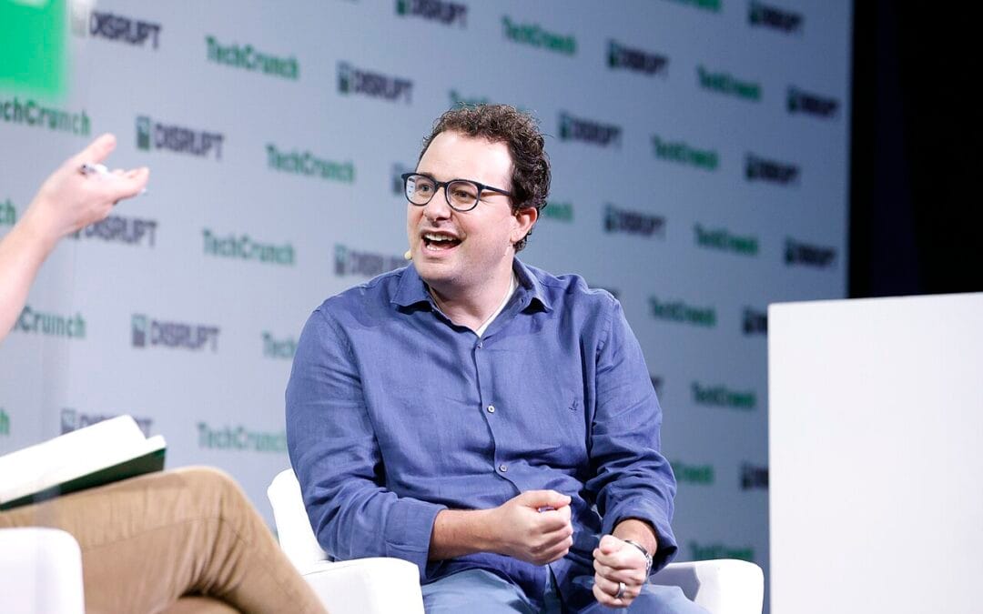 AI Divide analysis featuring Dario Amodei, Anthropic CEO, discussing AI risks to white-collar jobs
